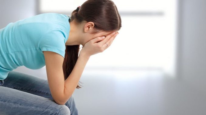 mulher triste aborto